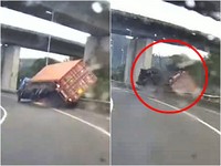 恐怖翻車！貨櫃車過彎「歪掉了」　駕駛墜20米橋下慘死