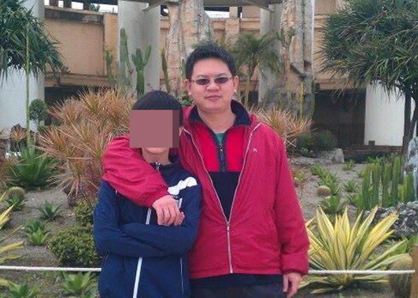 殉職的國道警察陳啟瑞及兒子。（圖／翻攝臉書）