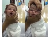 皺臉張嘴影片瘋傳！新生兒生病住院　慘遭護士玩弄捏臉