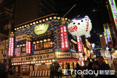 等不到遊客！大阪新世界地標「大河豚燈籠」百年老店宣布倒閉