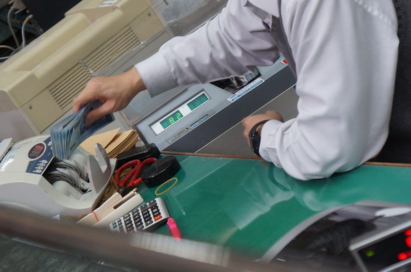 行員,銀行,臨櫃。（圖／資料照）